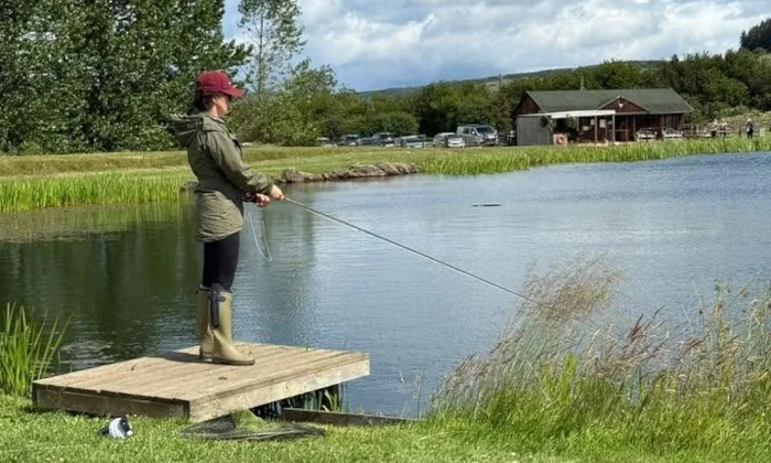 Lady angler on Chatton Lake