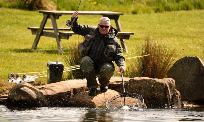 Angler landing his catch